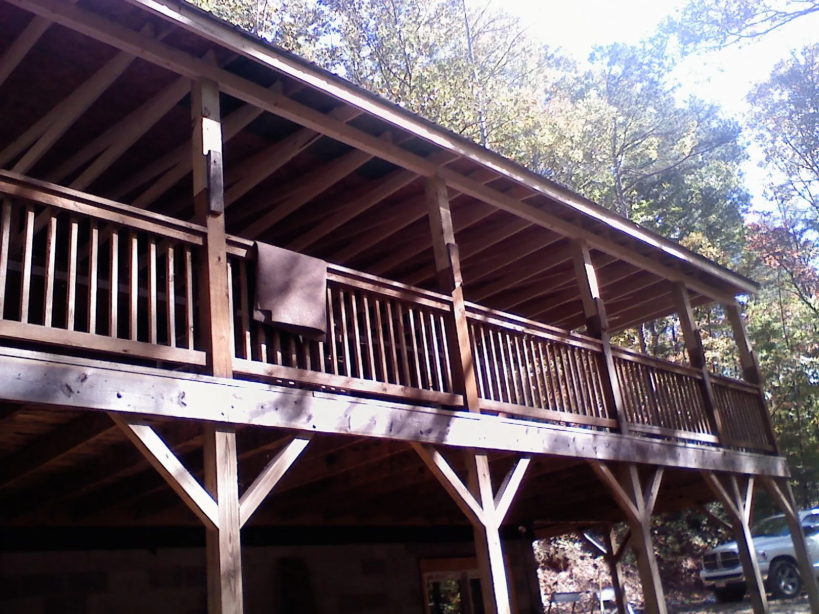 Timber framing under a new elevated porch and deck — Roof Leak Repair in Tomball by Roofing Brothers